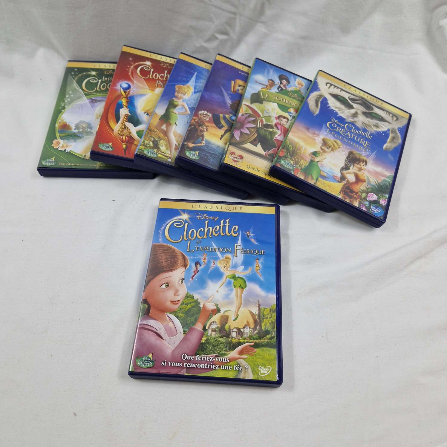 Voir photo 2 de Lot des 7 dvd la petite clochette Disney Lot des 7 dvd la petite clochette Disney Bon état - Vue 2 -