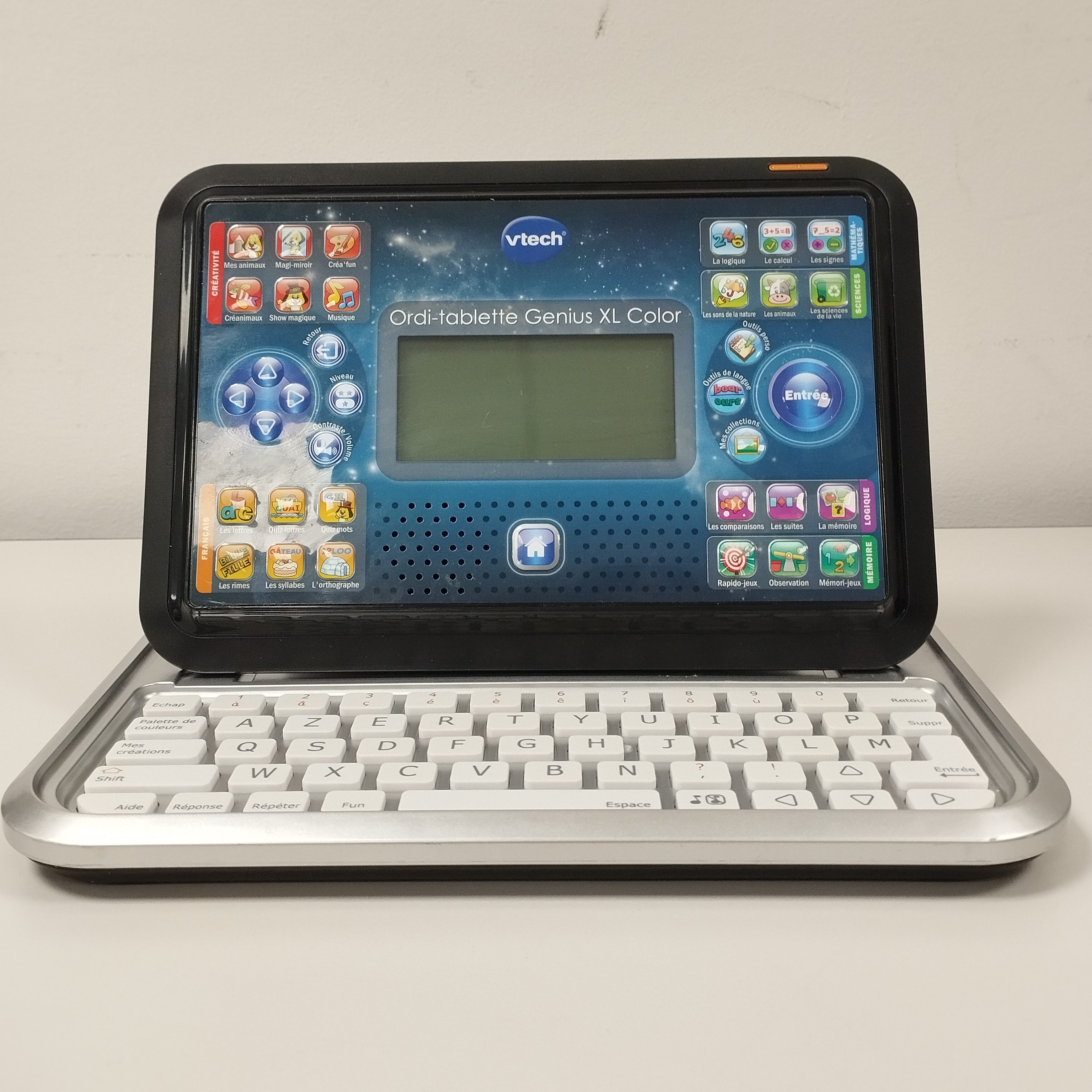 Voir photo 3 de Ordi-tablette éducatif VTech Genius XL Color Ordi-tablette éducatif VTech Genius XL Color Très bon état - Vue 3 -
