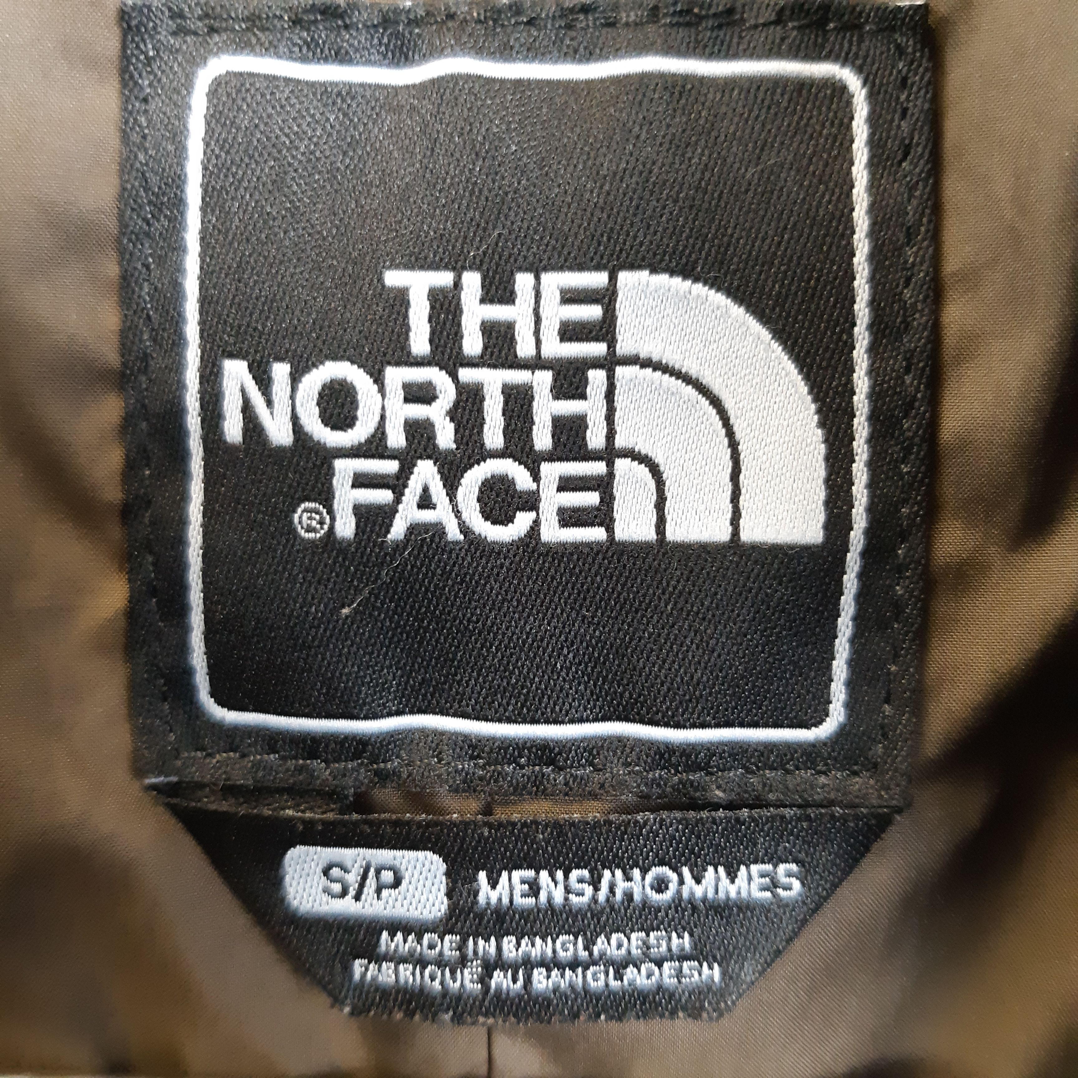 Voir photo 5 de The North Face - Veste sans manches kaki polyester - Taille 46 The North Face - Veste sans manches kaki polyester - Taille 46 Très bon état - Vue 5 -