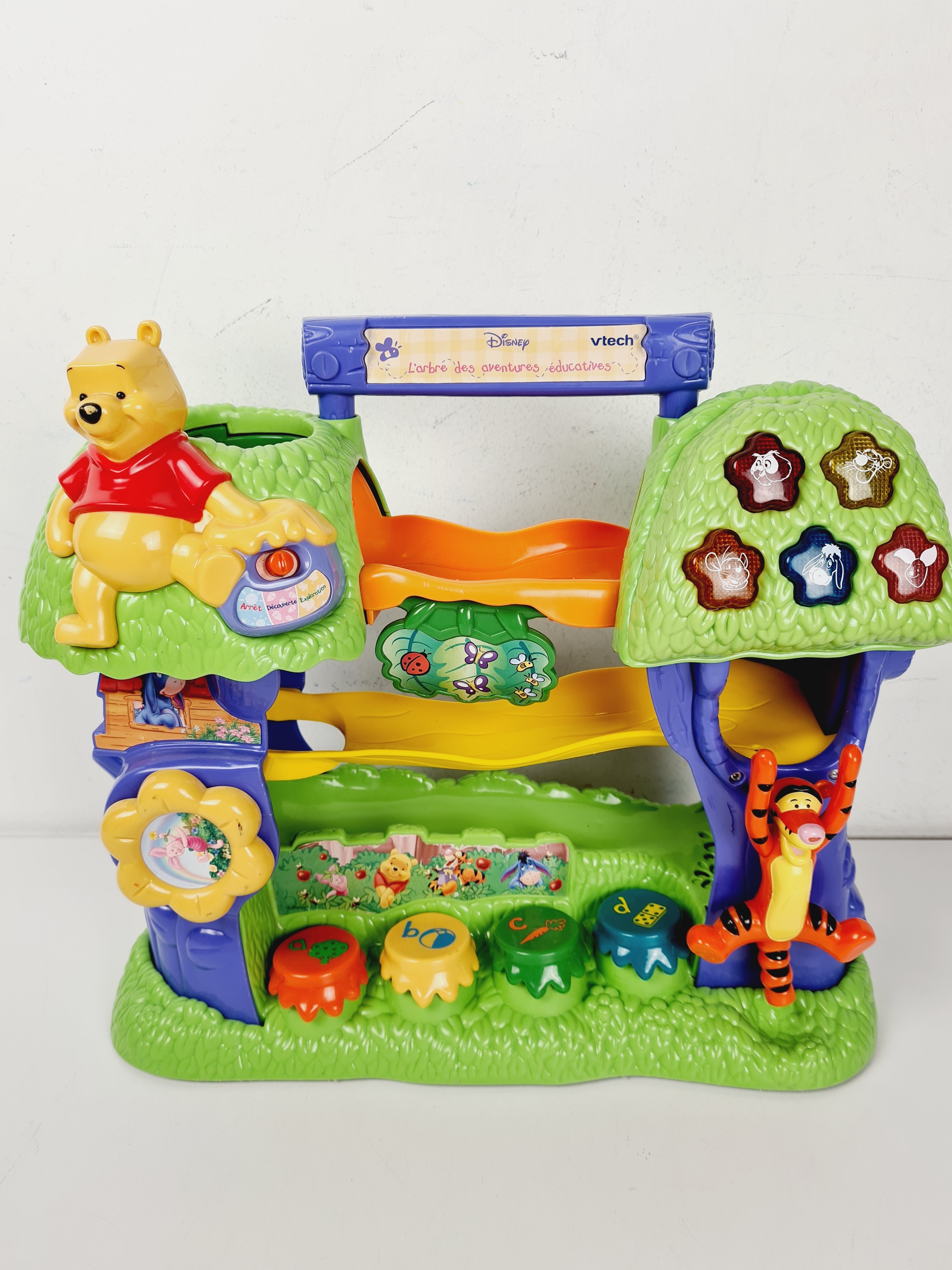 Voir photo 2 de Jouet 1er âge - L'arbre des aventures multi-activités - Winnie l'Ourson - Vtech - Dès 12 mois Jouet 1er âge - L'arbre des aventures multi-activités - Winnie l'Ourson - Vtech - Dès 12 mois Bon état - Vue 2 -
