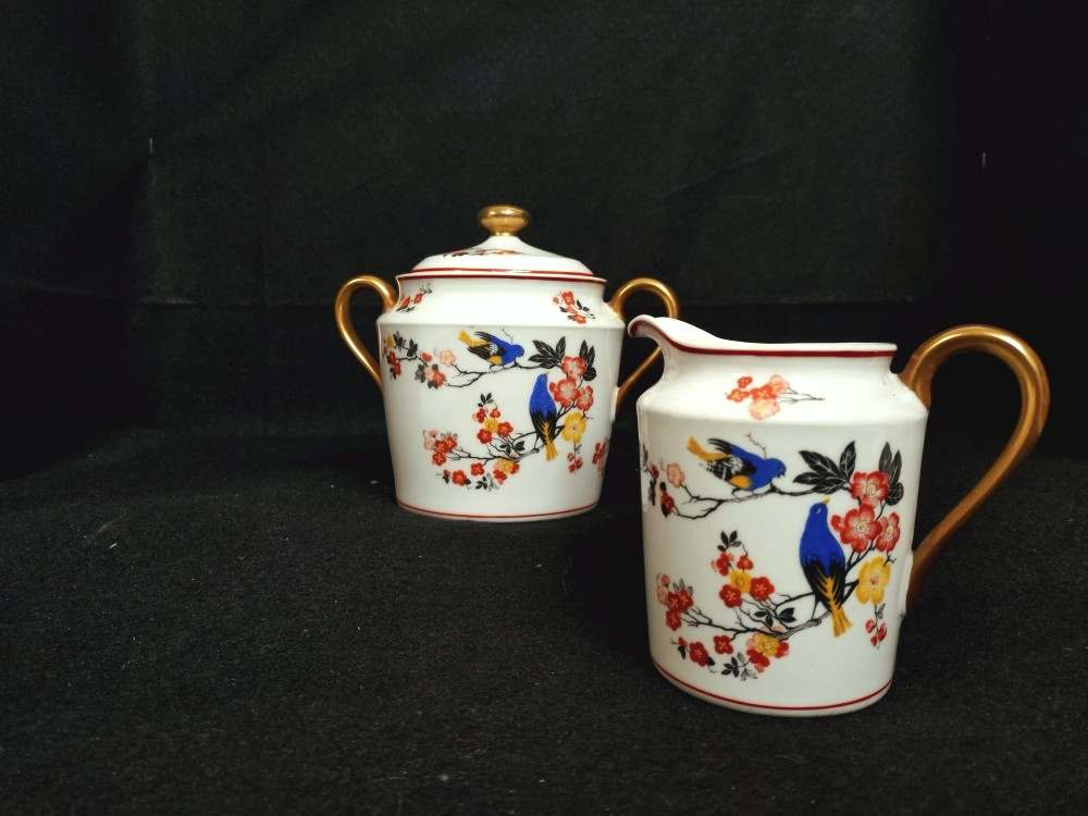 Petit pichet et son sucrier en porcelaine de Limoges, décor japonisant. - Photo 1
