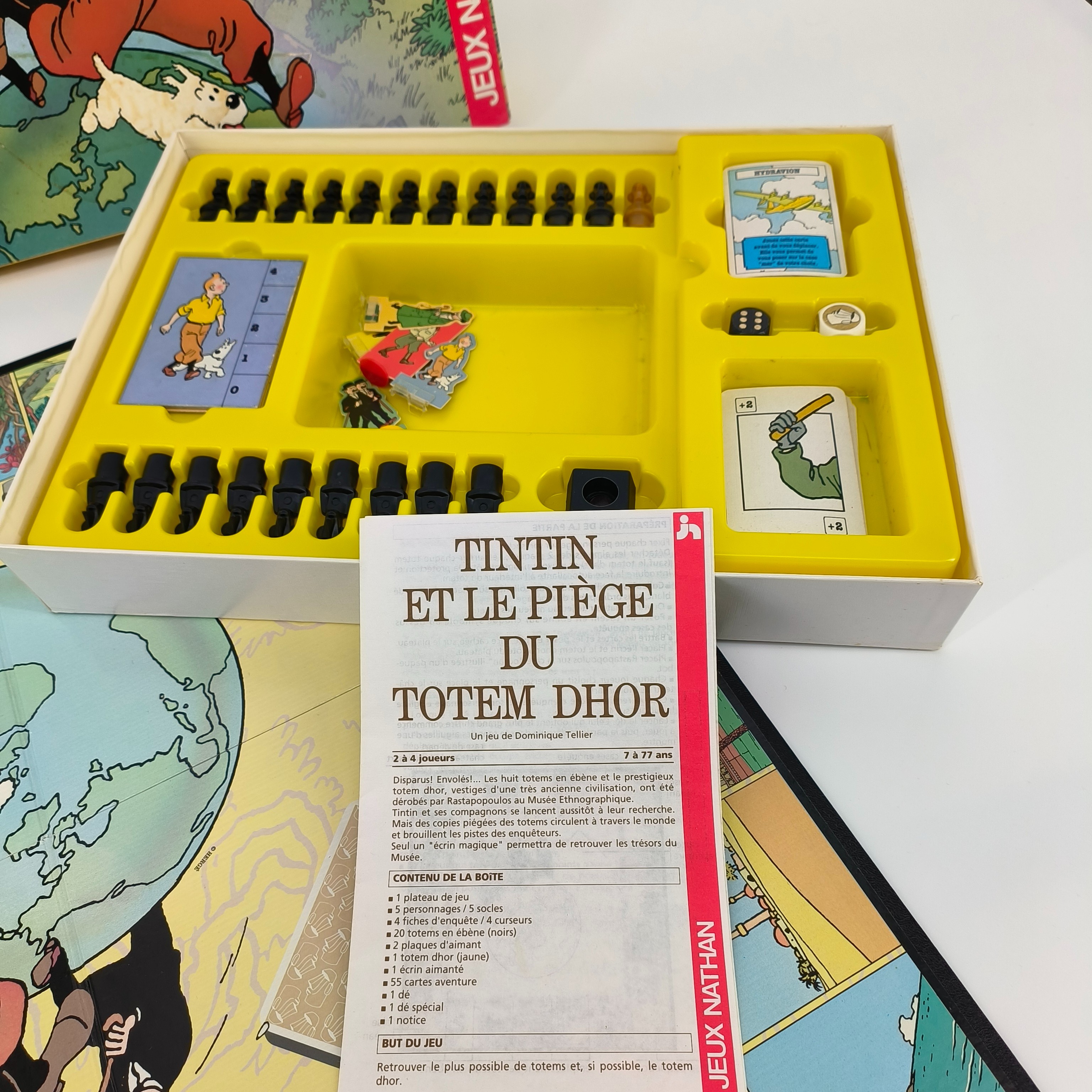 Voir photo 5 de Jeu de société-"Tintin et le piège du totem dhor"- Nathan-à partir de 7 ans Jeu de société-"Tintin et le piège du totem dhor"- Nathan-à partir de 7 ans Bon état - Vue 5 -