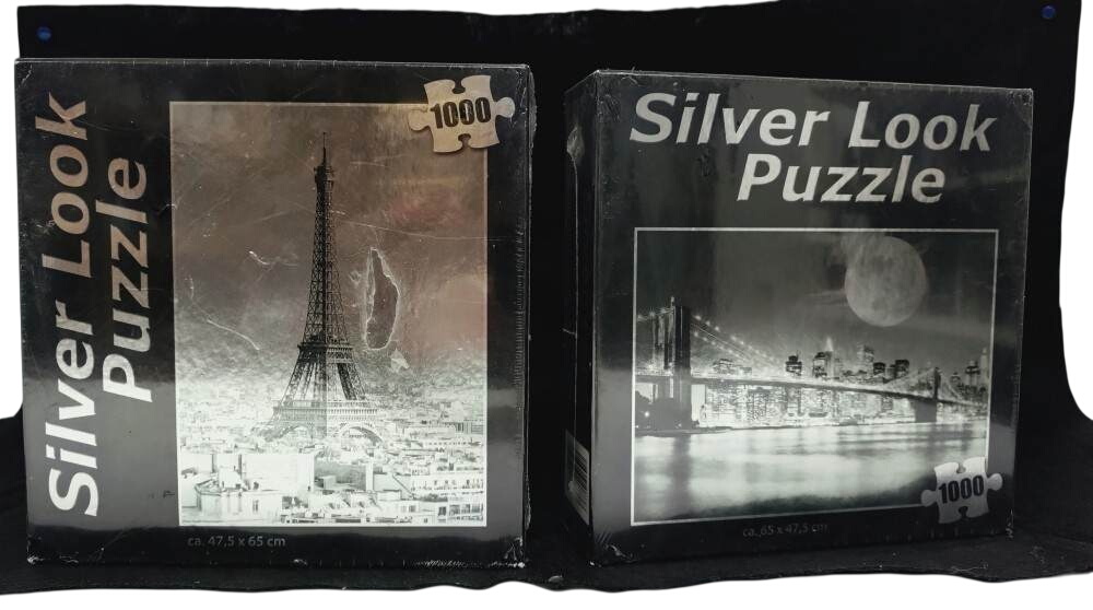 Lot de deux Puzzles Silver look, finition métallisé, 1000 pièces. Paris / Manhattan. Neuf. Comme neuf -  reconditionné disponible sur Label Emmaüs
