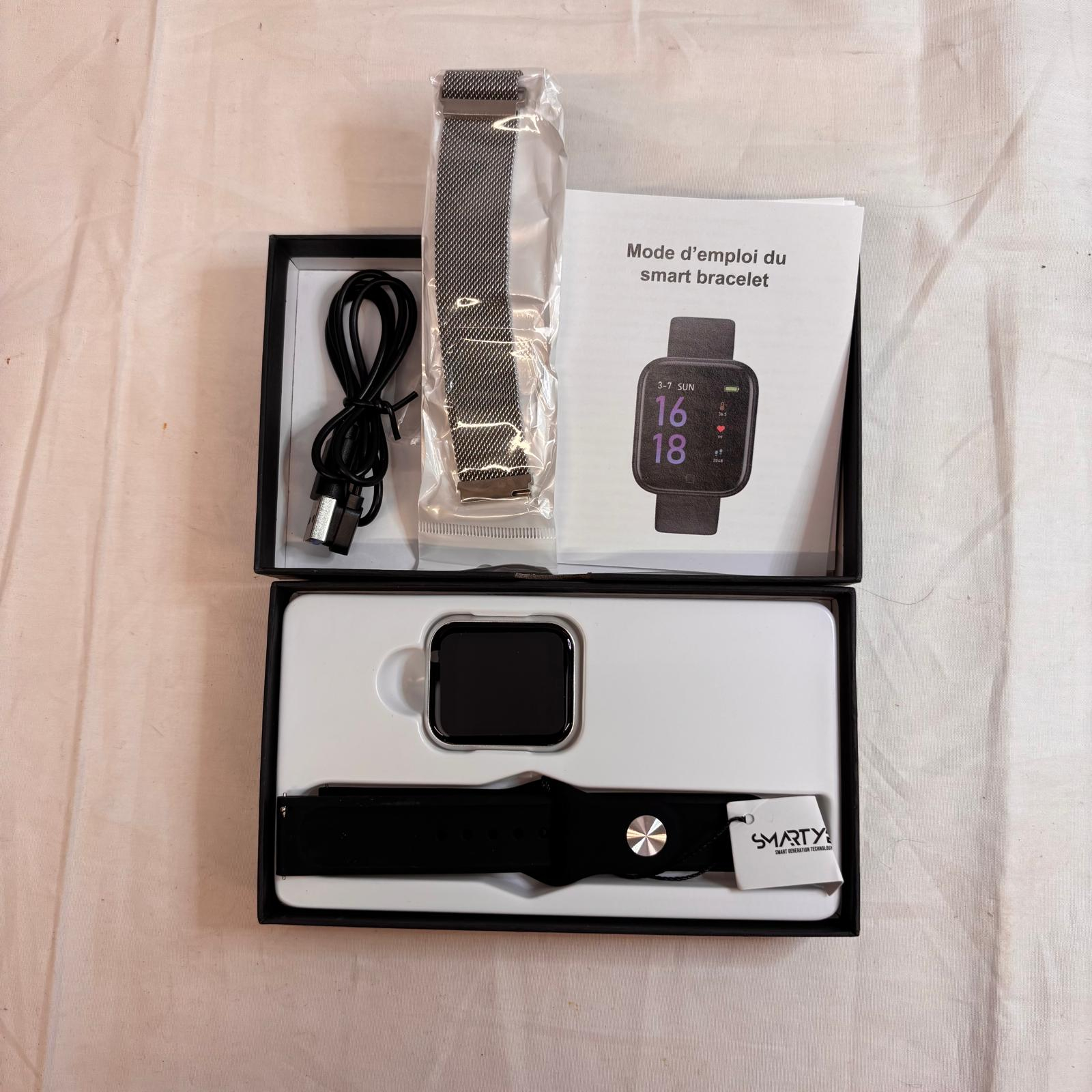 Voir photo 2 de Montre connectée Smarty 2.0 Wellness - SW013B Argent Montre connectée Smarty 2.0 Wellness - SW013B Argent Très bon état - Vue 2 -
