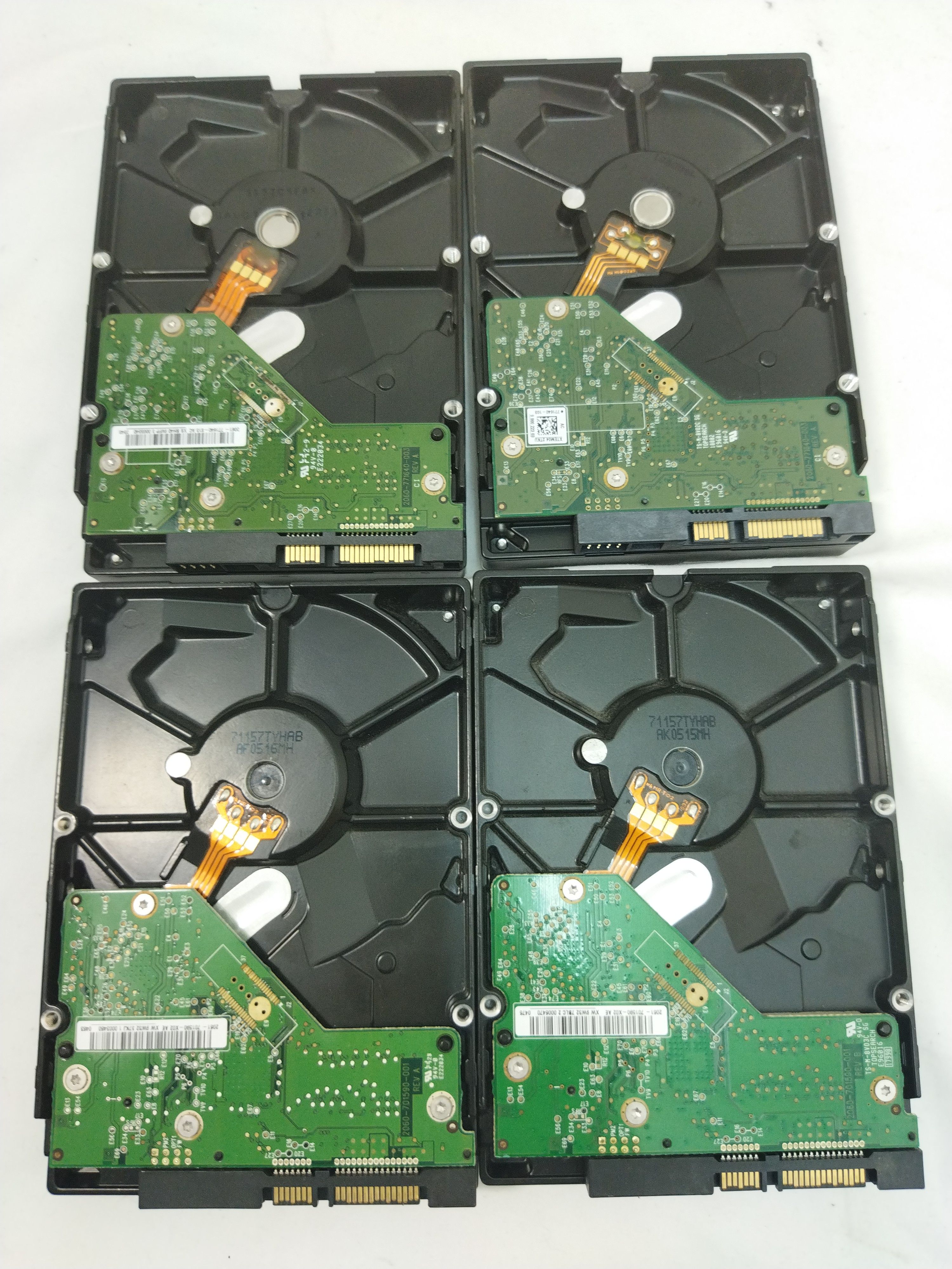 Voir photo 2 de Un lot de 4x disques durs -250 Go HDD en très bon état Un lot de 4x disques durs -250 Go HDD en très bon état - Vue 2 -